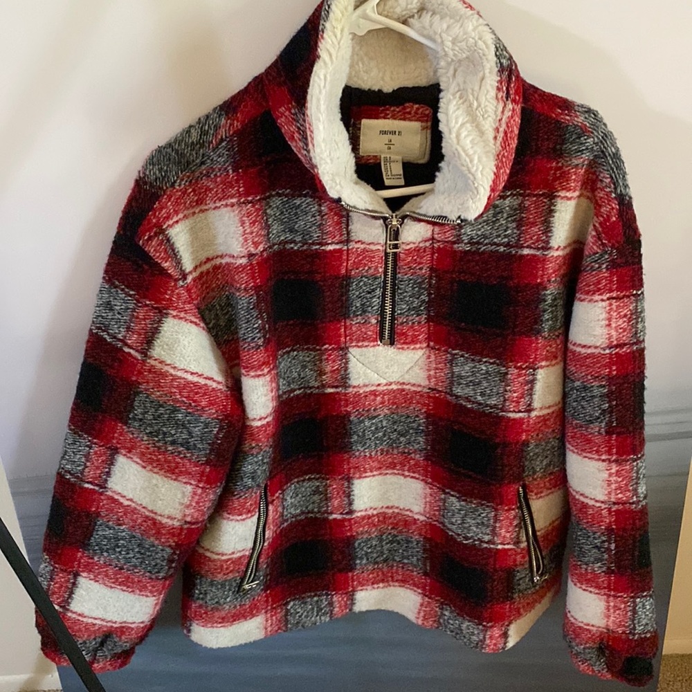 Traditional black and red plaid fleece jacket. Unlined